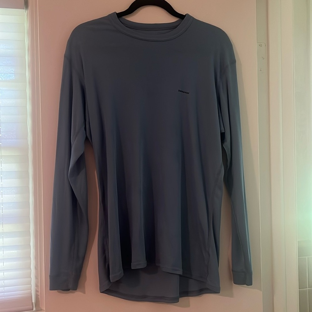 Blue Patagonia thermal women’s shirt size L